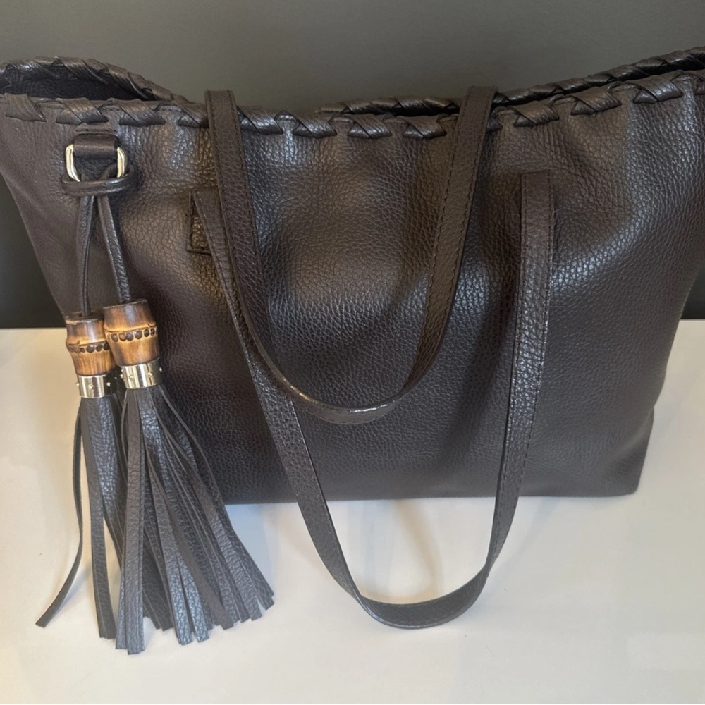 Gucci, brown leather tote with bamboo and tassels
